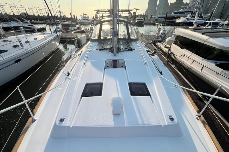 Wind Walker Yacht Photos Pics 2013 Beneteau Oceanis 41 sailboat docked in marina at sunset.