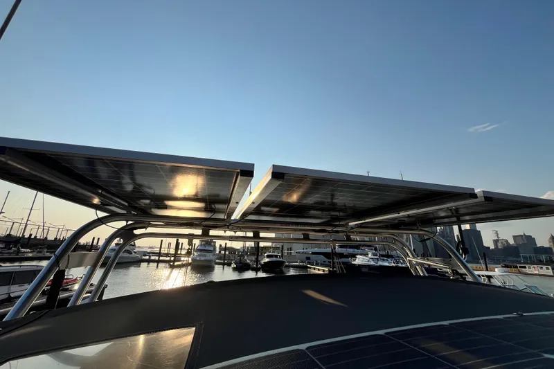 Wind Walker Yacht Photos Pics Solar panels on a 2013 Beneteau Oceanis 41 yacht at a marina during sunset.