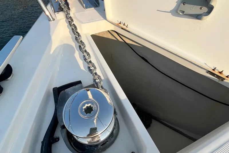 Wind Walker Yacht Photos Pics Anchor chain and windlass on a 2013 Beneteau Oceanis 41 sailboat deck.