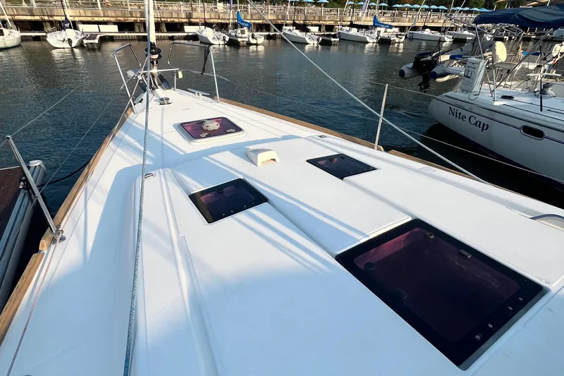 Wind Walker Yacht Photos Pics Beneteau Oceanis 41 sailboat deck, 2013 model, docked at marina with other boats.
