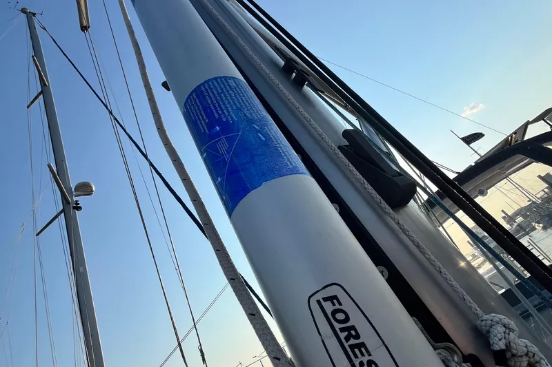 Wind Walker Yacht Photos Pics Mast of 2013 Beneteau Oceanis 41 sailboat with rigging and blue sky background.