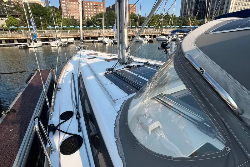 Wind Walker Yacht Photos Pics 2013 Beneteau Oceanis 41 sailboat docked at marina, showcasing sleek design and spacious deck.