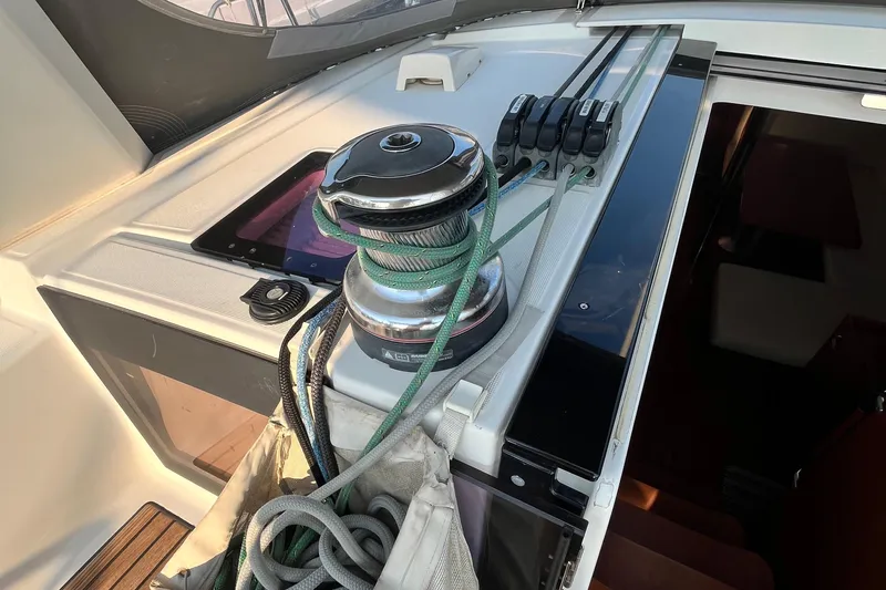 Wind Walker Yacht Photos Pics Cockpit view of 2013 Beneteau Oceanis 41 sailboat with winch and ropes.