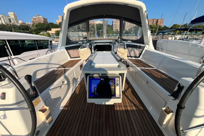 Wind Walker Yacht Photos Pics 2013 Beneteau Oceanis 41 sailboat cockpit with dual steering wheels and teak flooring.