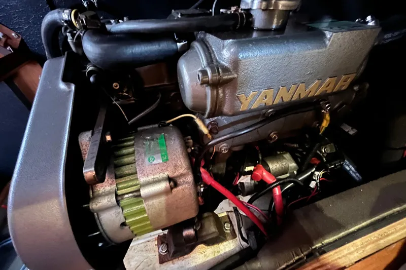 Wind Walker Yacht Photos Pics Yanmar engine in a 2013 Beneteau Oceanis 41 sailboat, showcasing mechanical components.