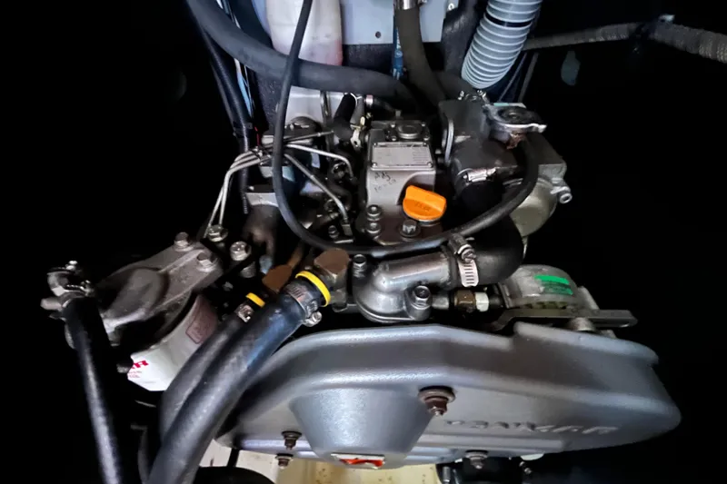 Wind Walker Yacht Photos Pics Engine of a 2013 Beneteau Oceanis 41 sailboat, showcasing intricate components and hoses.