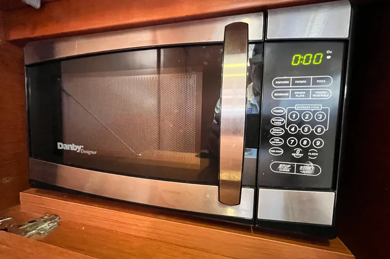 Wind Walker Yacht Photos Pics Microwave in 2013 Beneteau Oceanis 41 yacht kitchen, featuring Danby Designer model.