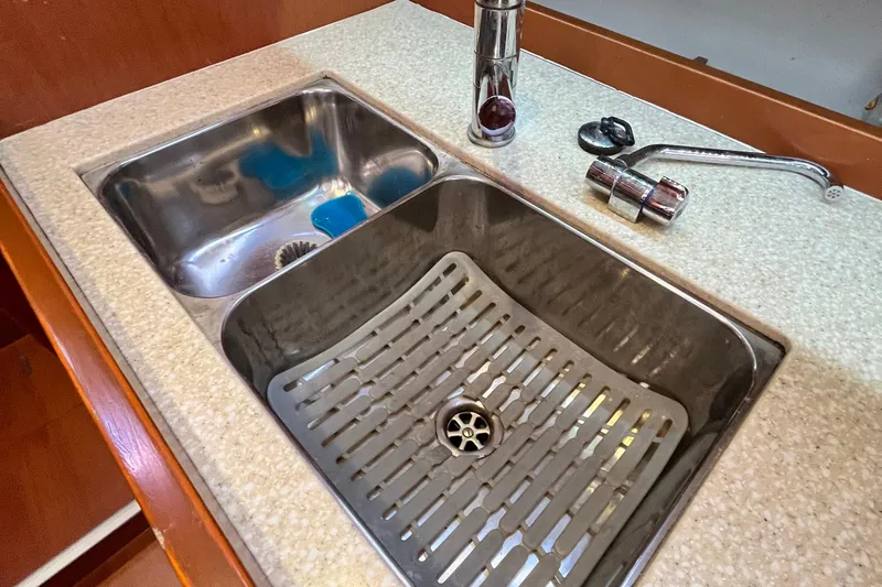 Wind Walker Yacht Photos Pics Stainless steel sink in 2013 Beneteau Oceanis 41 yacht kitchen.