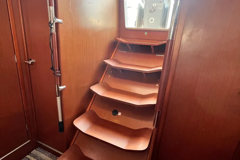 Wind Walker Yacht Photos Pics Interior wooden stairs of 2013 Beneteau Oceanis 41 sailboat, leading to deck.