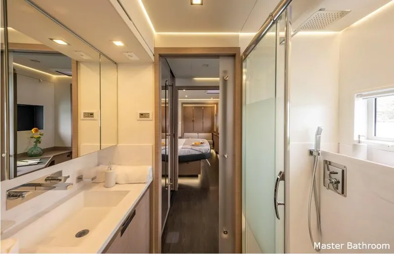 Semper Fidelis Yacht Photos Pics Luxurious bathroom on Fountaine Pajot Alegria 67 yacht, 2022 model.