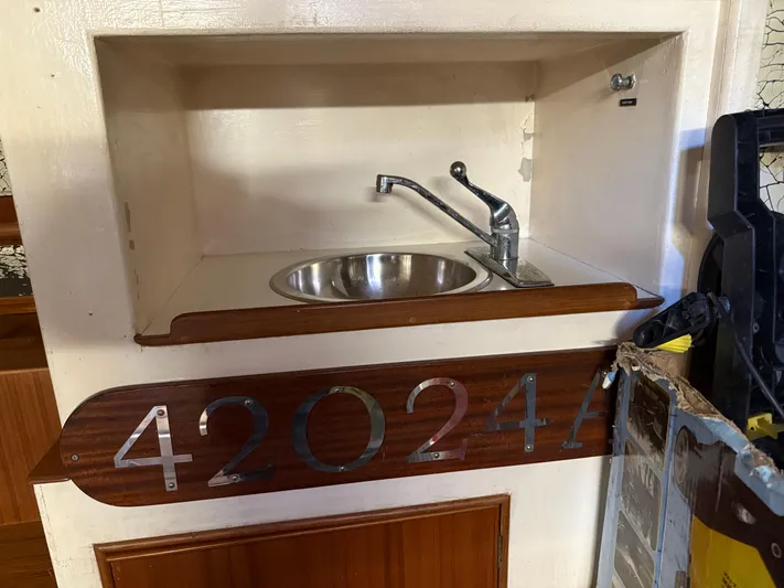 Aramis II Yacht Photos Pics Small sink area on a 1990 Grand Banks 49 boat with number 420244.