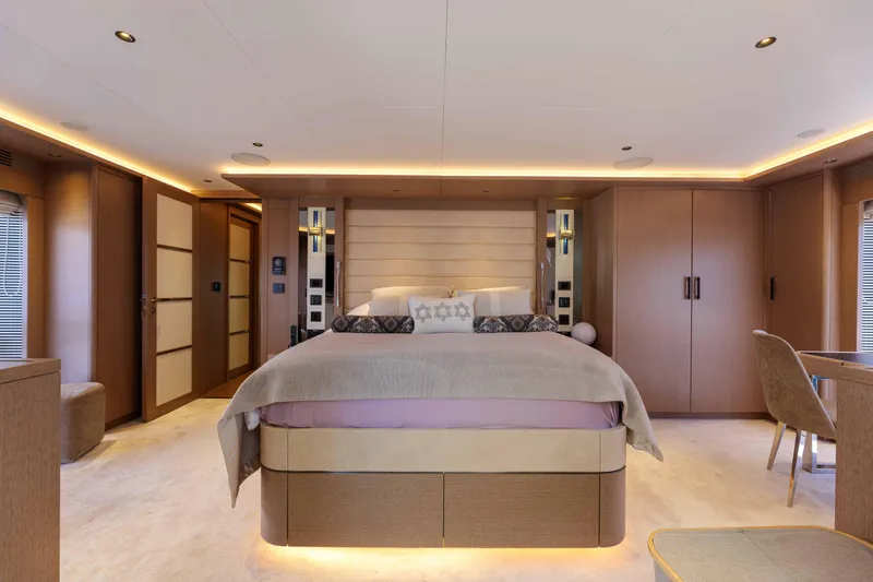 Heliophilia Yacht Photos Pics Luxurious interior of 2024 Sirena 88 yacht with elegant bedroom design.