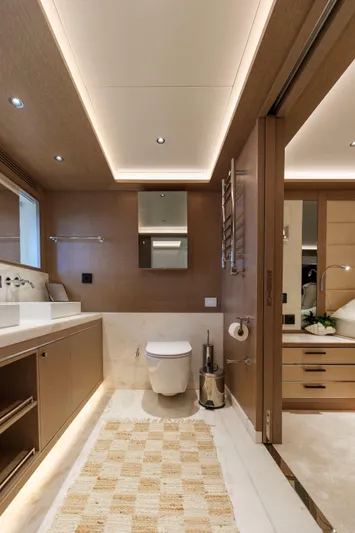 Heliophilia Yacht Photos Pics Luxurious bathroom interior on 2024 Sirena 88 yacht, featuring modern fixtures and elegant design.