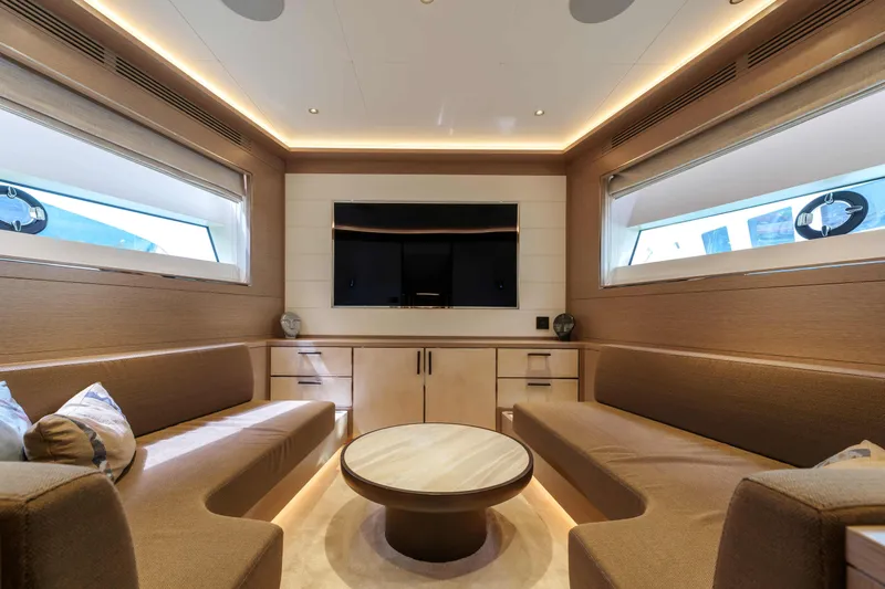 Heliophilia Yacht Photos Pics Luxurious interior of 2024 Sirena 88 yacht with elegant seating and modern decor.