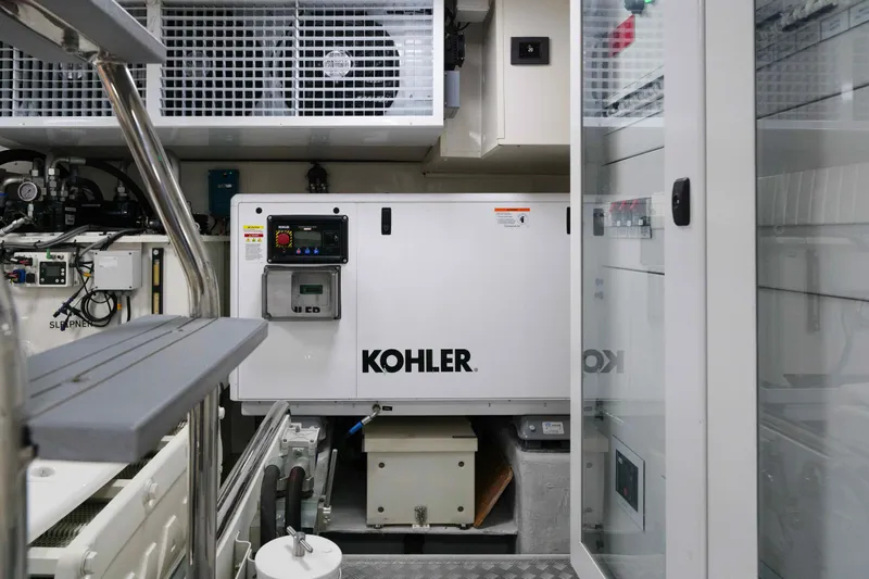 Heliophilia Yacht Photos Pics Engine room of 2024 Sirena 88 yacht featuring Kohler generator.