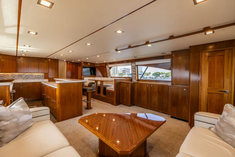 2020 Viking 80 Yacht Photos Pics Luxurious interior of 2020 Viking 80 Convertible yacht with elegant wood finishes.