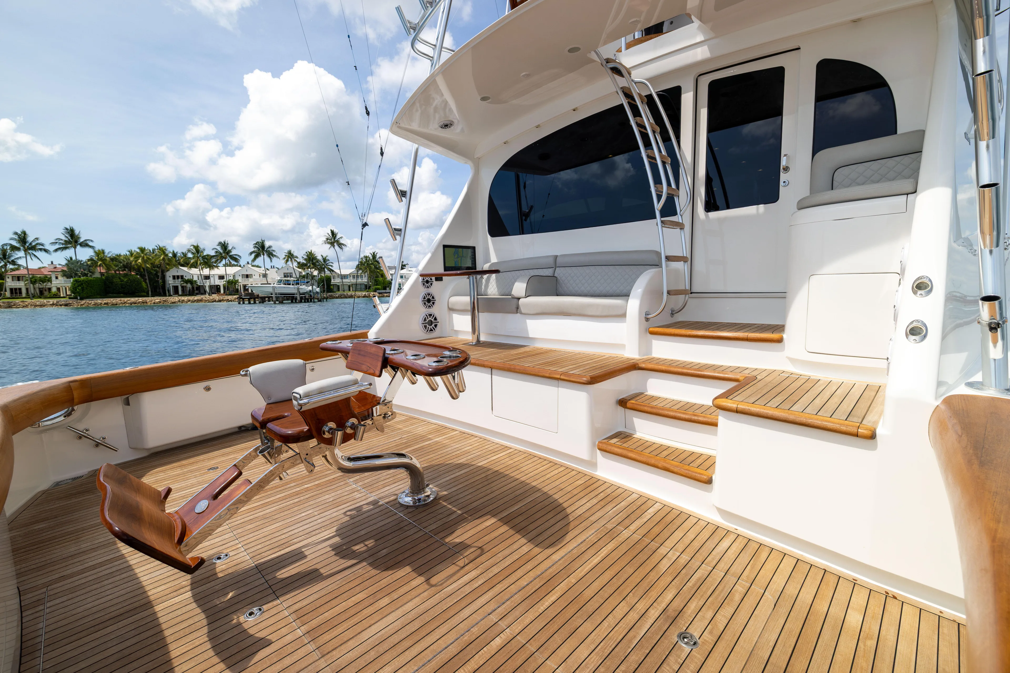 2020 Viking 80 Yacht Photos Pics Luxurious 2020 Viking 80 Convertible yacht deck with wooden flooring and seating area.
