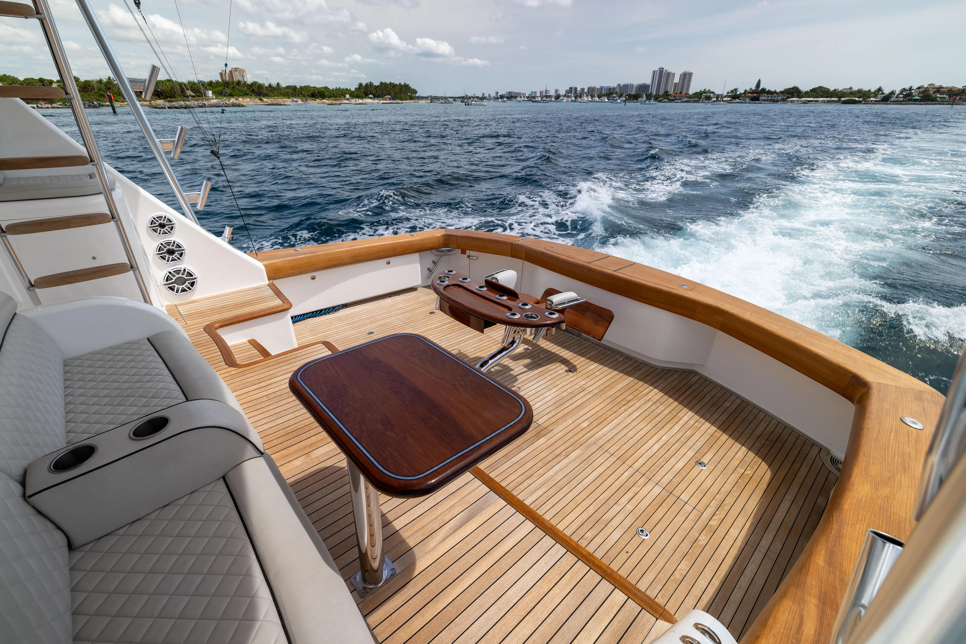 2020 Viking 80 Yacht Photos Pics 2020 Viking 80 Convertible yacht deck with ocean view and seating area.