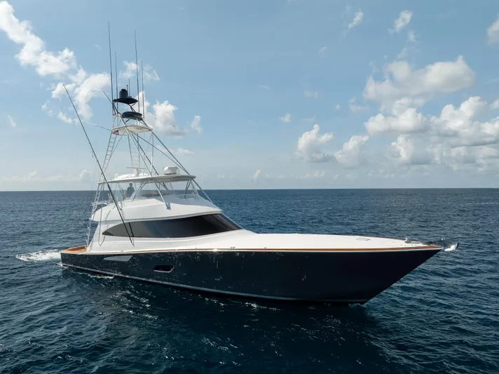 2020 Viking 80 Yacht Photos Pics 2020 Viking 80 Convertible yacht cruising on open sea under clear skies.