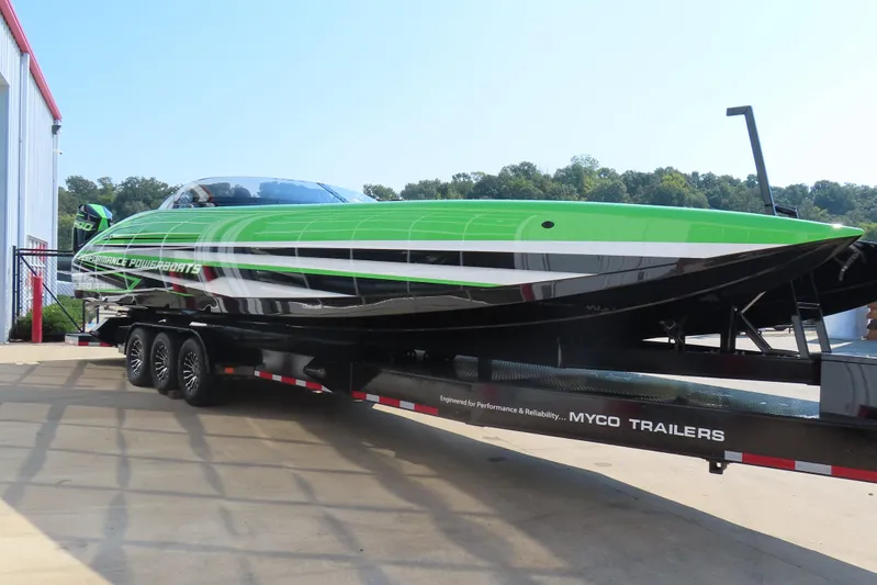  Yacht Photos Pics 2025 Performance Powerboat P360 in vibrant green on a trailer, ready for adventure.