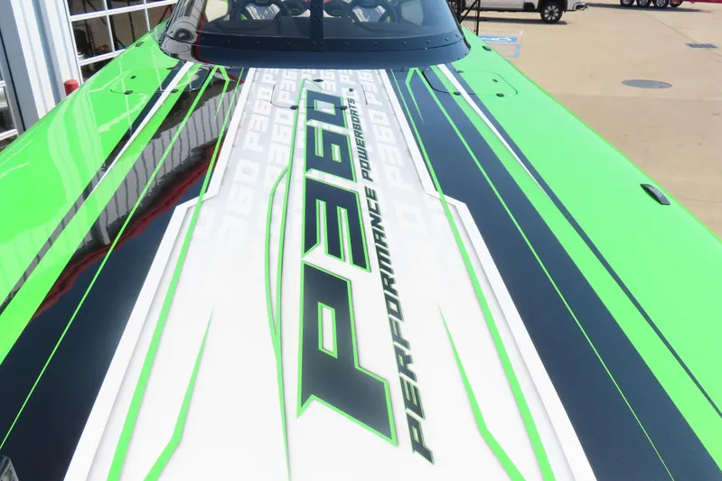  Yacht Photos Pics 2025 Performance Powerboat P360 with vibrant green and black design.