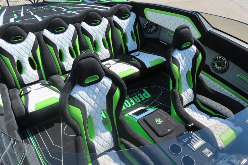  Yacht Photos Pics Luxurious interior of 2025 Performance Powerboat p360 with green and white seating.