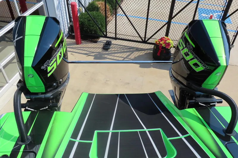  Yacht Photos Pics 2025 Performance Powerboat p360 with dual Racing 500 engines, featuring vibrant green and black design.
