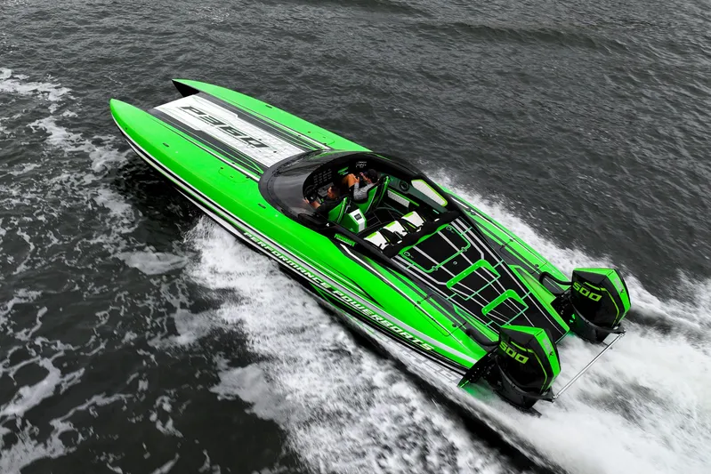  Yacht Photos Pics 2025 Performance Powerboats P360 in vibrant green, speeding across water.