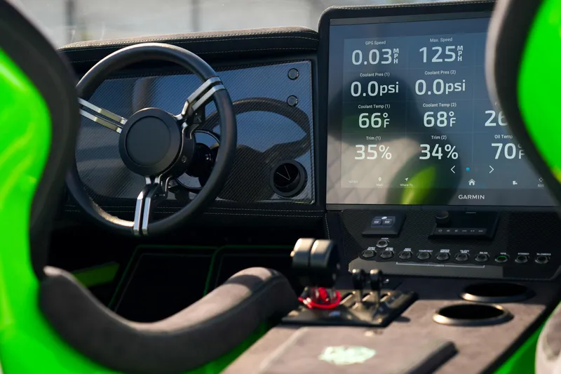  Yacht Photos Pics 2025 Performance Powerboats P360 cockpit with advanced digital dashboard and steering wheel.