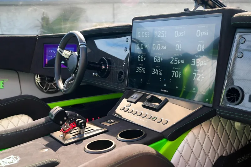  Yacht Photos Pics 2025 Performance Powerboats P360 cockpit with advanced digital dashboard and steering wheel.