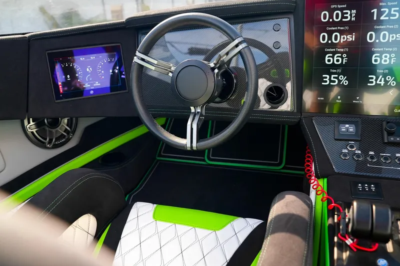  Yacht Photos Pics Interior of 2025 Performance Powerboats P360 with modern dashboard and steering wheel.