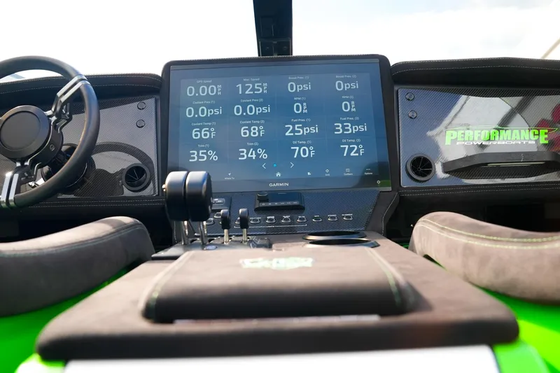  Yacht Photos Pics Dashboard of 2025 Performance Powerboats P360 with advanced digital controls and steering wheel.