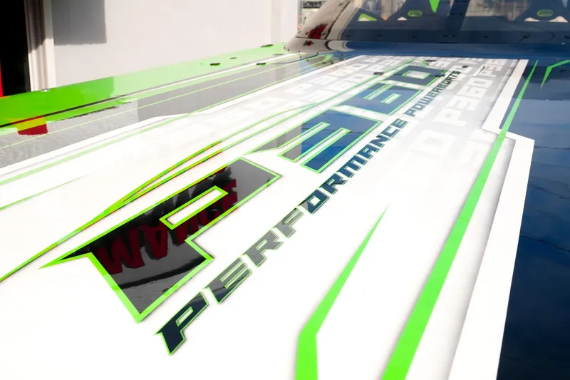  Yacht Photos Pics 2025 Performance Powerboats P360 with sleek green and white design accents.
