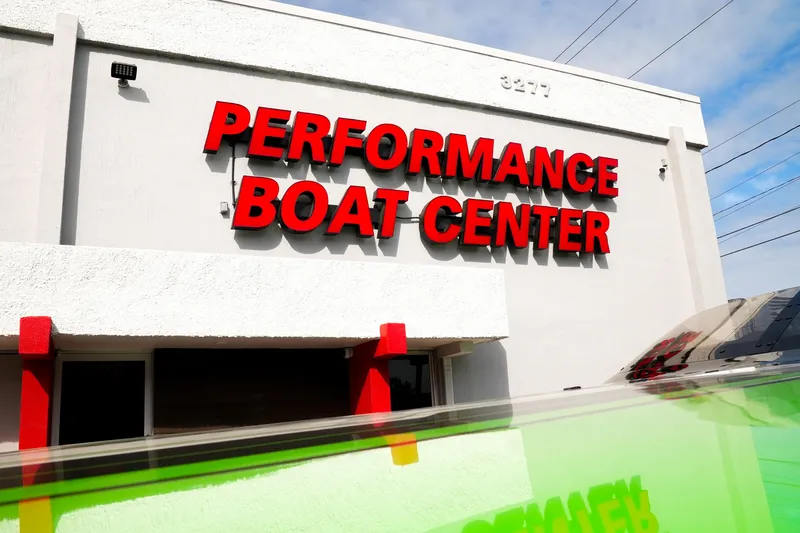  Yacht Photos Pics Performance Boat Center building exterior with bold red signage, showcasing Performance Powerboats P360, 2025 model.