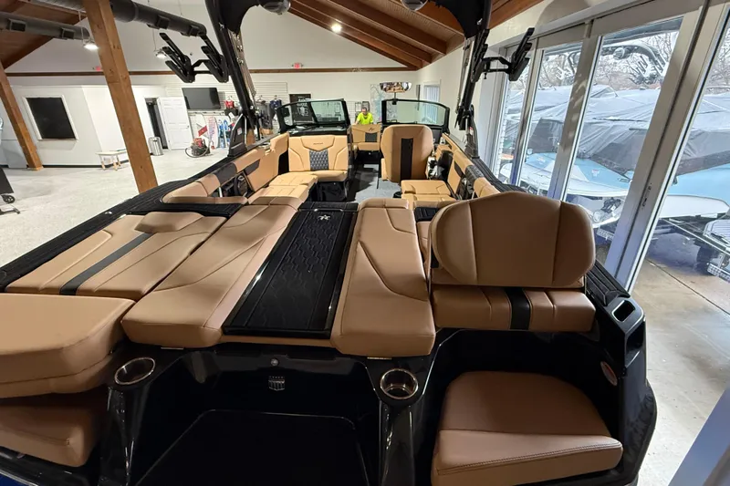  Yacht Photos Pics 2026 MasterCraft XT24 boat interior with luxurious tan seating and modern design.