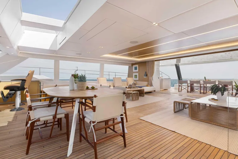  Yacht Photos Pics Luxurious interior of 2026 Sunreef 80 Sunreef Power yacht with elegant seating and ocean view.