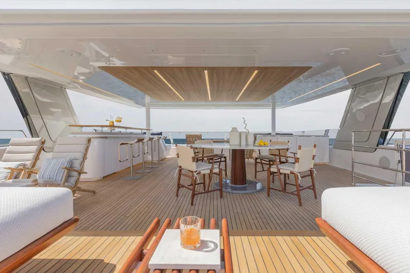  Yacht Photos Pics Luxurious 2026 Sunreef 80 Power yacht deck with elegant seating and bar area.