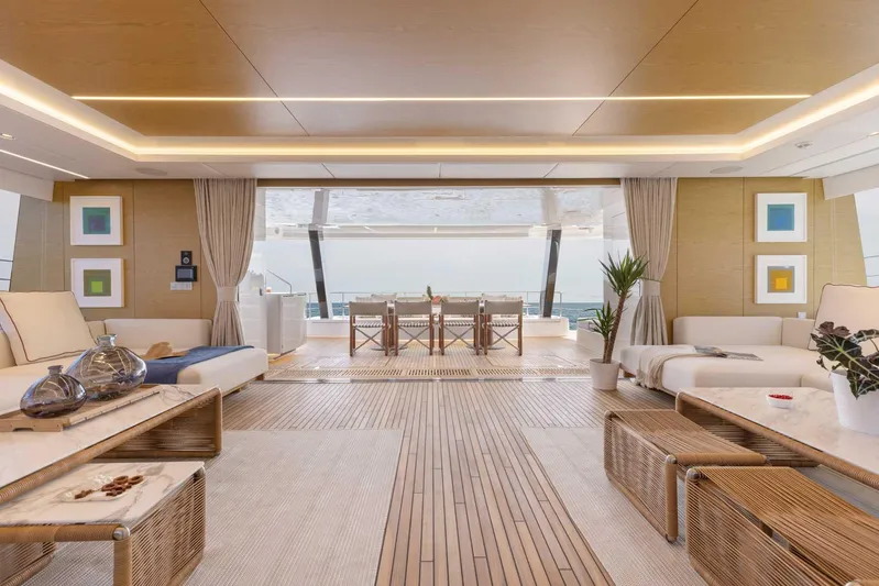  Yacht Photos Pics Luxurious interior of 2026 Sunreef 80 Sunreef Power yacht with elegant furnishings and ocean view.