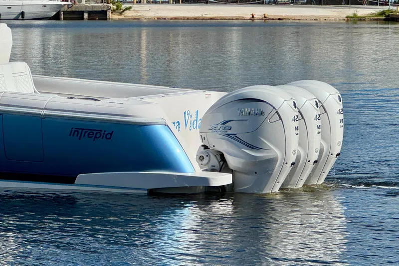 Yacht Photos Pics 2020 Intrepid 407 Nomad FE with triple Yamaha outboard engines on water.