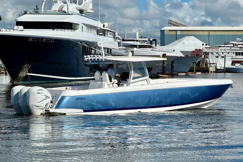  Yacht Photos Pics 2020 Intrepid 407 Nomad FE boat with Yamaha engines docked in marina.