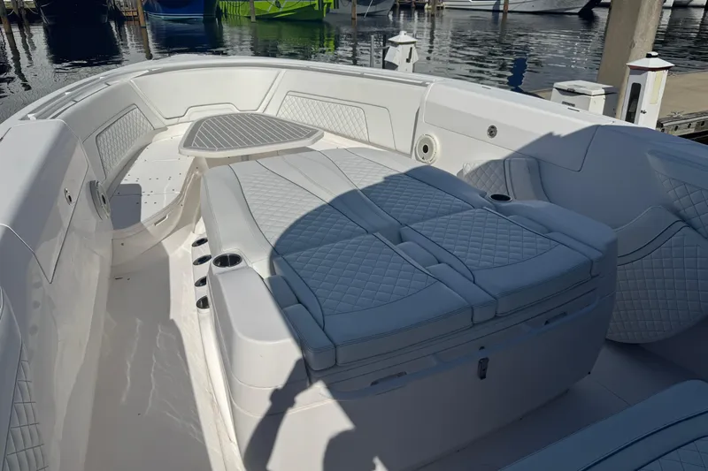  Yacht Photos Pics 2020 Intrepid 407 Nomad FE boat interior with luxurious seating and sleek design.