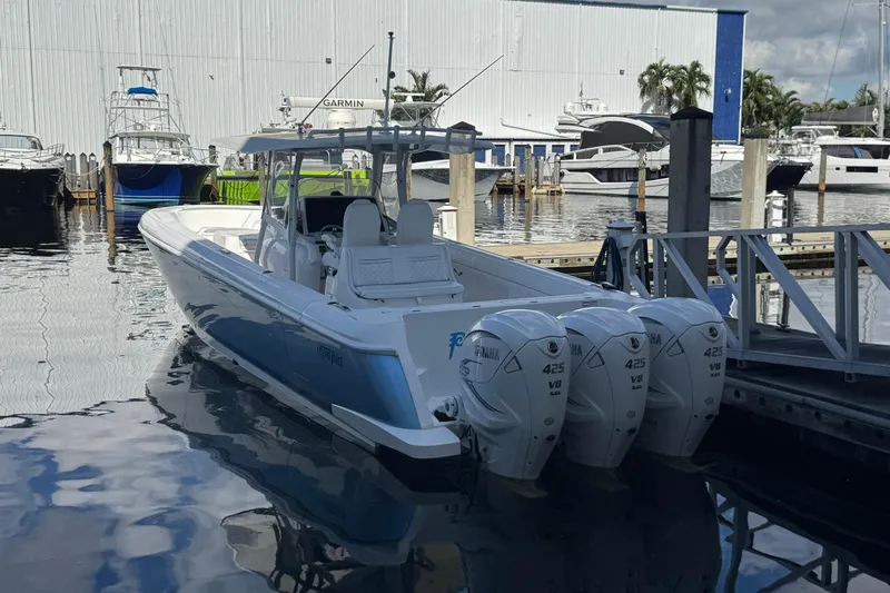  Yacht Photos Pics 2020 Intrepid 407 Nomad FE boat docked with triple Yamaha 425 V8 engines.