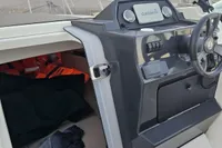 2017 Quicksilver 675 Sundeck boat interior with Garmin navigation system.