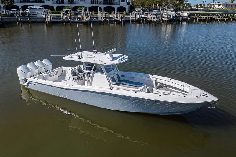  Yacht Photos Pics 2024 Invincible 39 Open Fisherman boat on calm water.