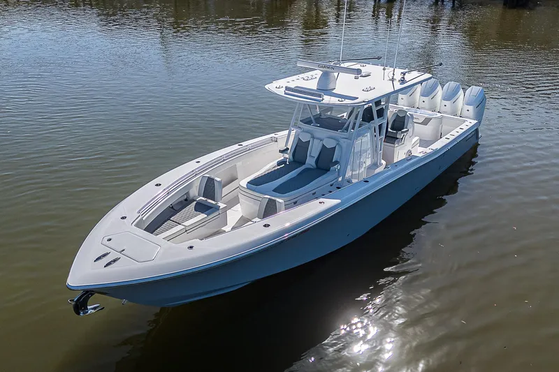  Yacht Photos Pics 2024 Invincible 39 Open Fisherman boat on calm water.