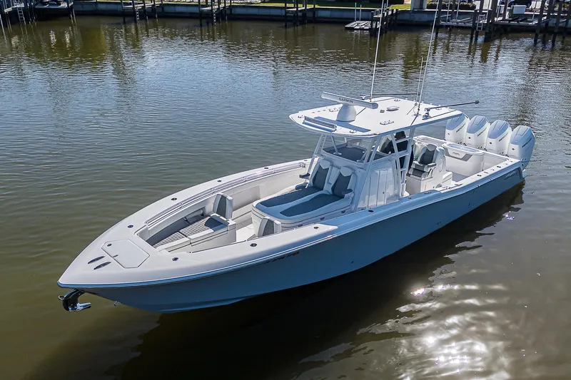  Yacht Photos Pics 2024 Invincible 39 Open Fisherman boat on calm water.
