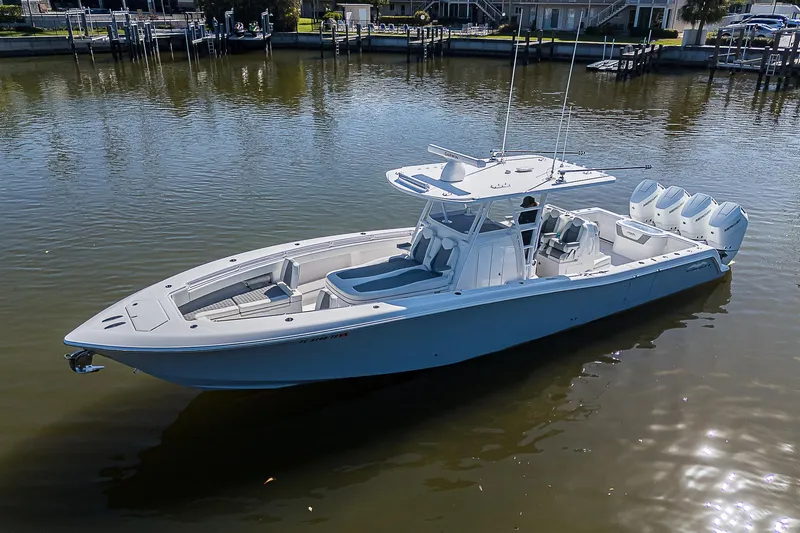  Yacht Photos Pics 2024 Invincible 39 Open Fisherman boat on calm water.