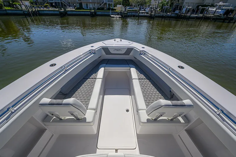  Yacht Photos Pics 2024 Invincible 39 Open Fisherman boat with spacious seating and sleek design.