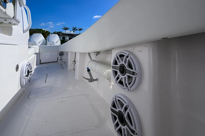  Yacht Photos Pics 2024 Invincible 39 Open Fisherman boat interior with speakers and clean deck design.