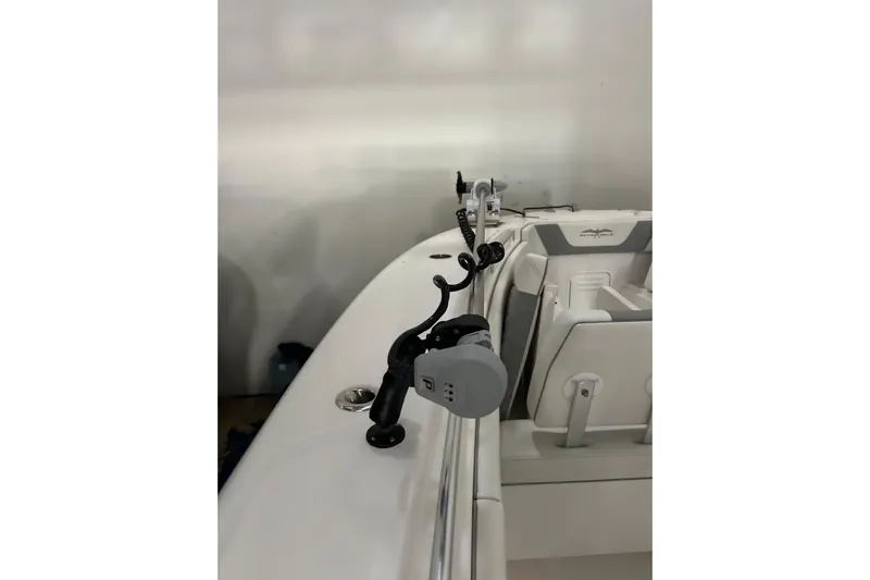  Yacht Photos Pics 2024 Invincible 39 Open Fisherman boat interior with rod holders and seating.